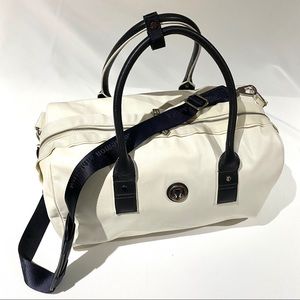 Lululemon Duffle Bag. In cream and black accents.